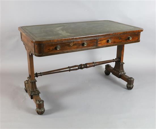 An early Victorian rosewood writing table, W.4ft D.2ft 3in. H.2ft 6in.